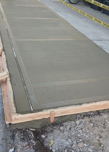 How thick should a concrete sidewalk be