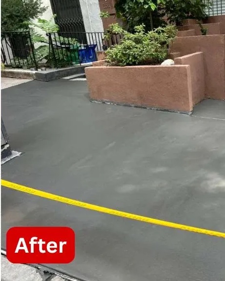 Freshly poured sidewalk flags outside 151 E 37th St after the landmarked repair