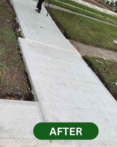 Level, newly poured concrete sidewalk on Remsen Ave in Canarsie, Brooklyn, after repair